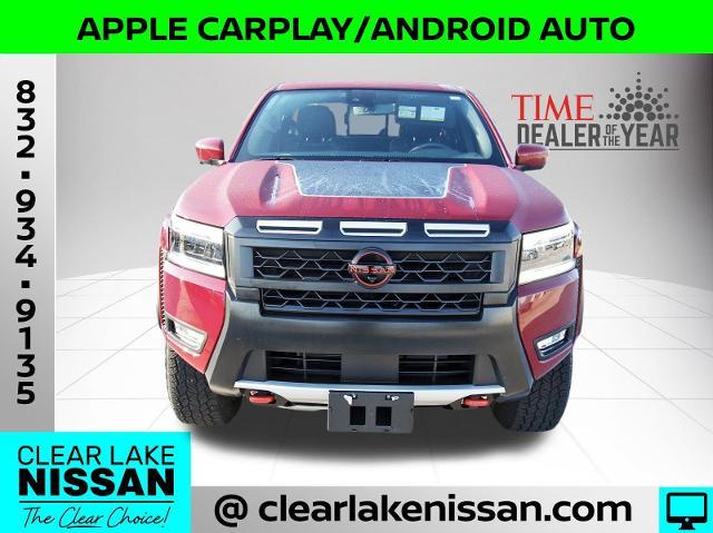 Photo of 2025 Cardinal Red Metallic Nissan Frontier