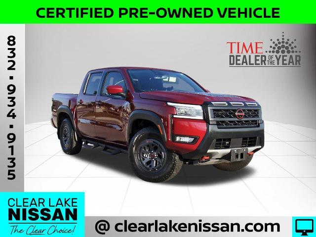 Photo of 2025 Cardinal Red Metallic Nissan Frontier