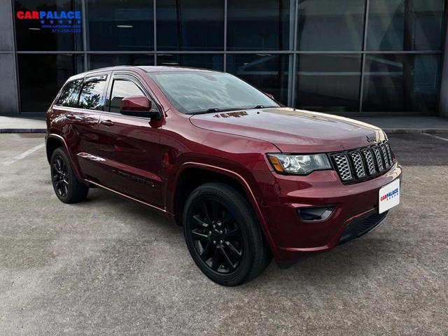 Photo of 2018 Burgundy Jeep Grand Cherokee