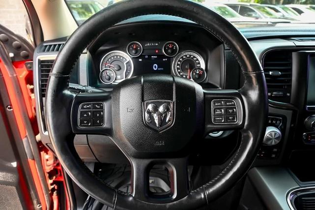 Photo of 2016 Flame Red Clearcoat RAM 1500
