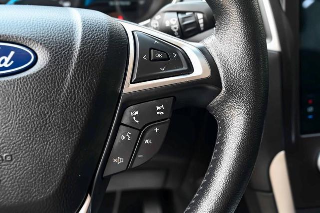 Photo of 2021 Agate Black Metallic Ford Edge