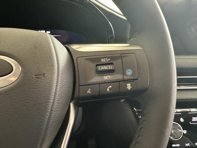 Photo of 2025 Warm Titanium INFINITI QX60