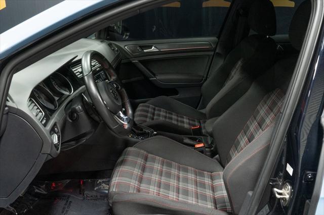 Photo of 2021 Deep Black Volkswagen Golf GTI