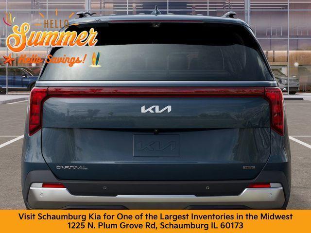 Photo of 2026 Astra Blue Kia Carnival Hybrid