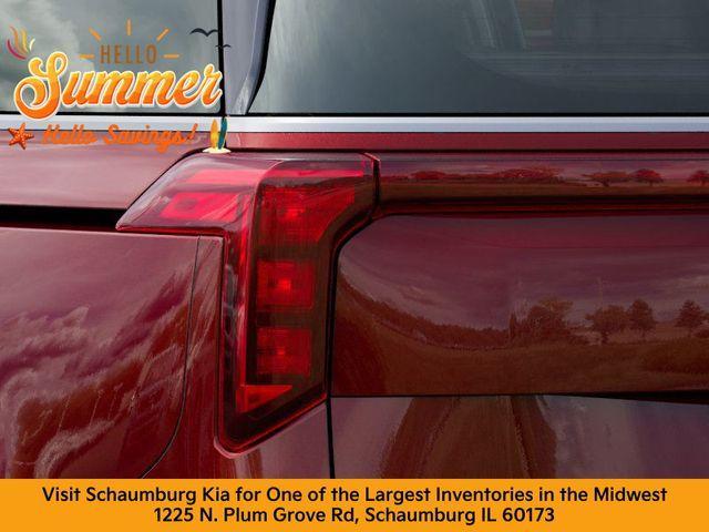 Photo of 2026 Flare Red Kia Carnival Hybrid