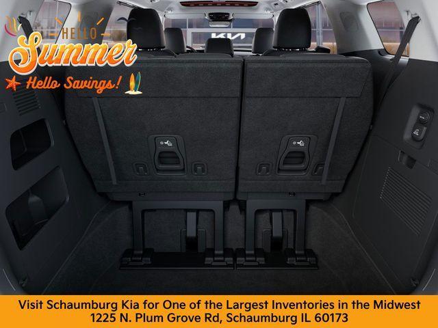 Photo of 2026 Flare Red Kia Carnival Hybrid