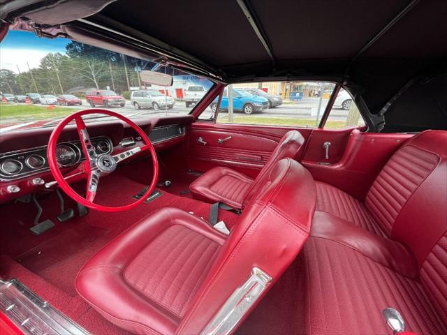 Photo of 1965 Red/ Tan Ford Mustang