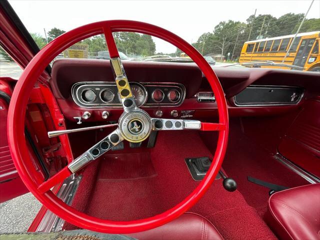 Photo of 1965 Red/ Tan Ford Mustang