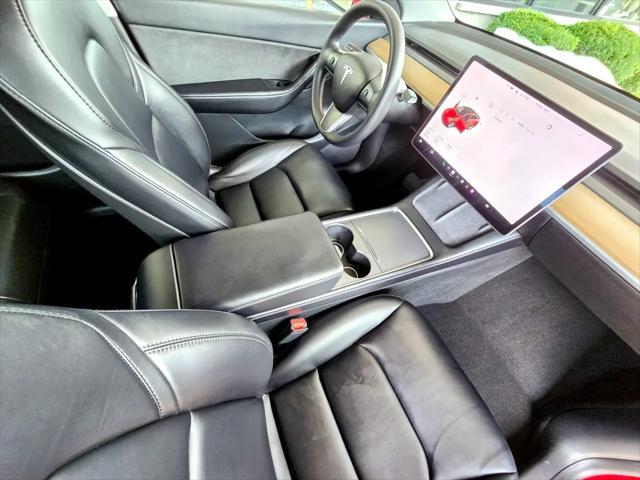 Photo of 2021 Red Multi-Coat Tesla Model Y