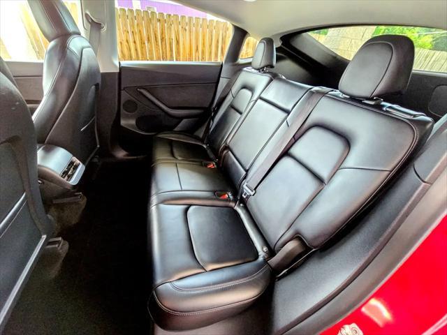 Photo of 2021 Red Multi-Coat Tesla Model Y