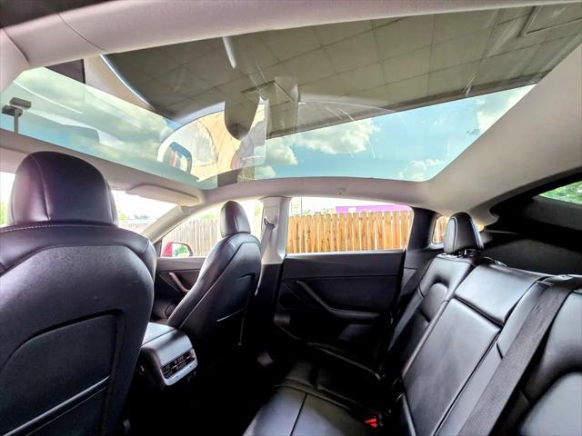 Photo of 2021 Red Multi-Coat Tesla Model Y