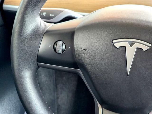 Photo of 2021 Red Multi-Coat Tesla Model Y