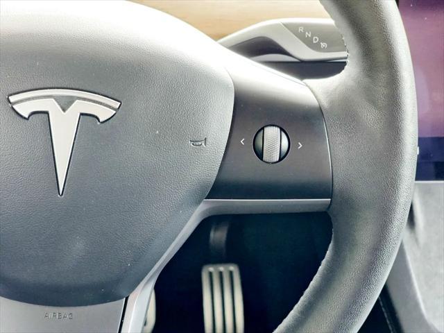 Photo of 2022 Pearl White Multi-Coat Tesla Model Y