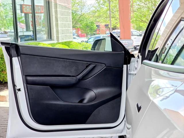 Photo of 2022 Pearl White Multi-Coat Tesla Model Y