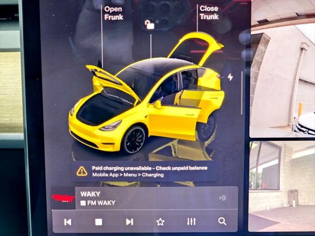 Photo of 2022 Pearl White Multi-Coat Tesla Model Y