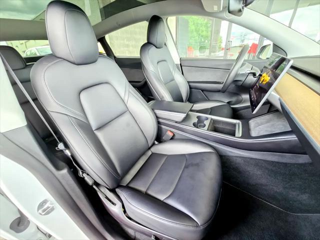 Photo of 2022 Pearl White Multi-Coat Tesla Model Y