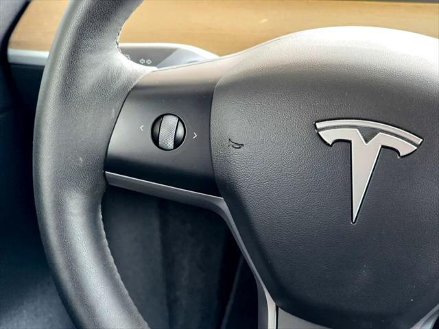 Photo of 2022 Pearl White Multi-Coat Tesla Model Y