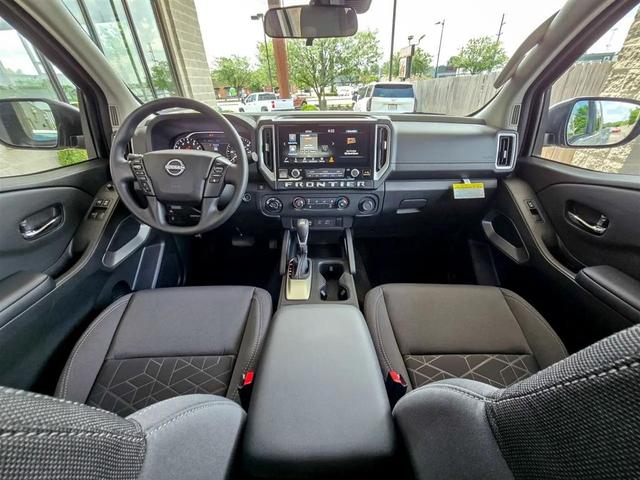 Photo of 2025 Glacier White Nissan Frontier