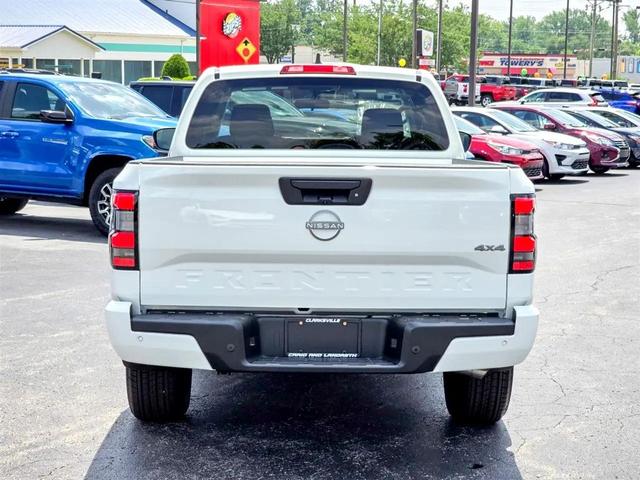 Photo of 2025 Glacier White Nissan Frontier