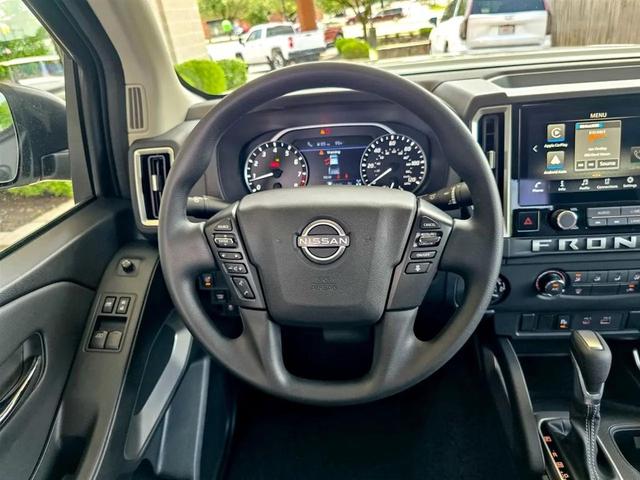 Photo of 2025 Glacier White Nissan Frontier