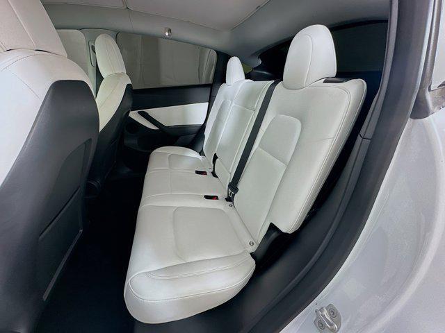 Photo of 2022 Pearl White Multi-Coat Tesla Model Y