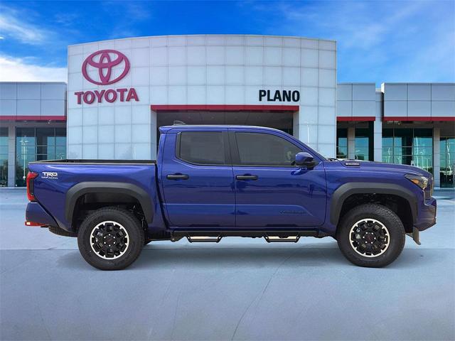Photo of 2025 Blue Crush Metallic Toyota Tacoma