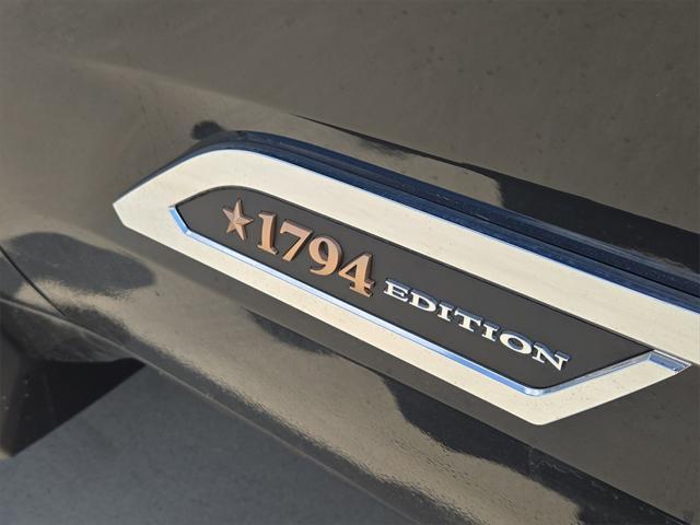 Photo of 2025 Midnight Black Metallic Toyota Tundra Hybrid