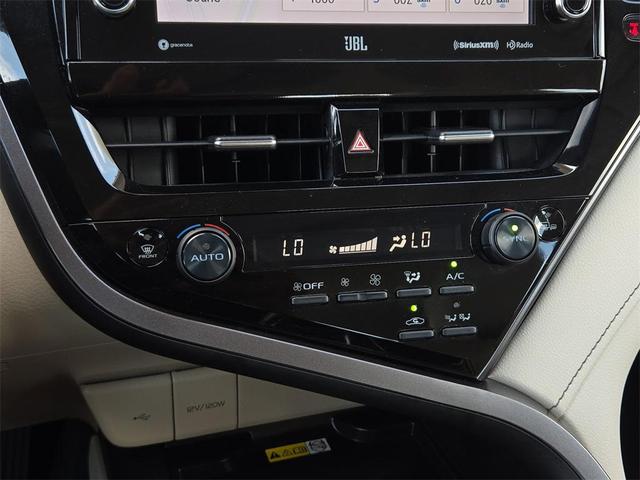 Photo of 2023 Wind Chill Pearl Toyota Camry Hybrid