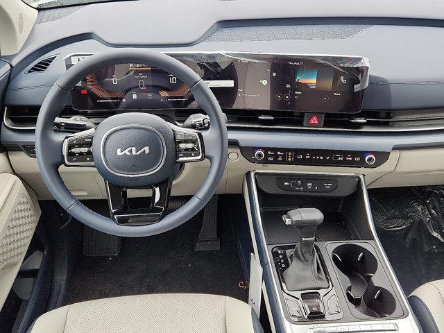 Photo of 2026 Ivory Silver Kia Carnival