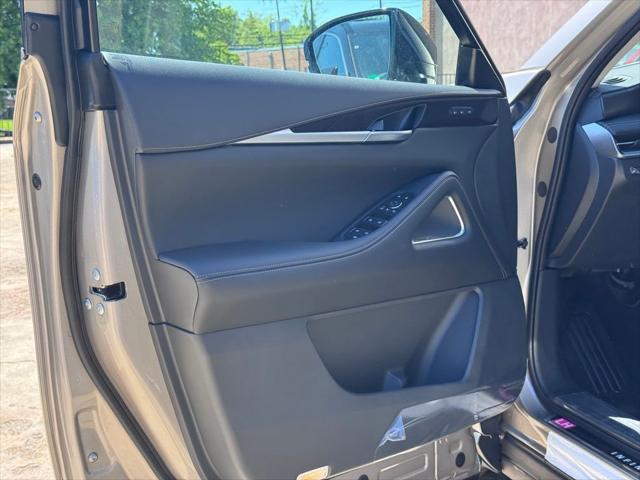 Photo of 2025 Warm Titanium INFINITI QX60