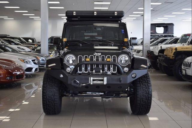 Photo of 2016 Black Clearcoat Jeep Wrangler Unlimited