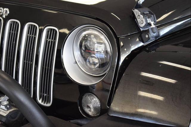 Photo of 2016 Black Clearcoat Jeep Wrangler Unlimited