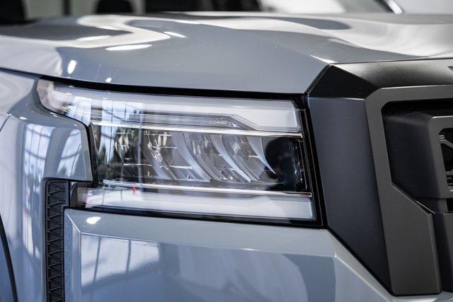 Photo of 2023 Boulder Gray Pearl Nissan Frontier