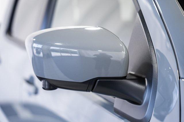 Photo of 2023 Boulder Gray Pearl Nissan Frontier