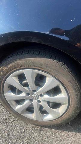 Photo of 2023 Midnight Black Metallic Toyota Corolla