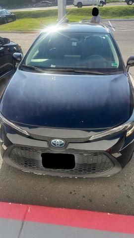 Photo of 2023 Midnight Black Metallic Toyota Corolla