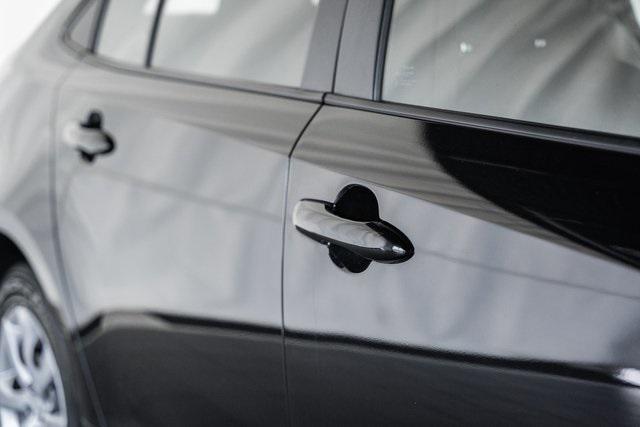 Photo of 2023 Midnight Black Metallic Toyota Corolla