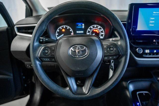 Photo of 2023 Midnight Black Metallic Toyota Corolla