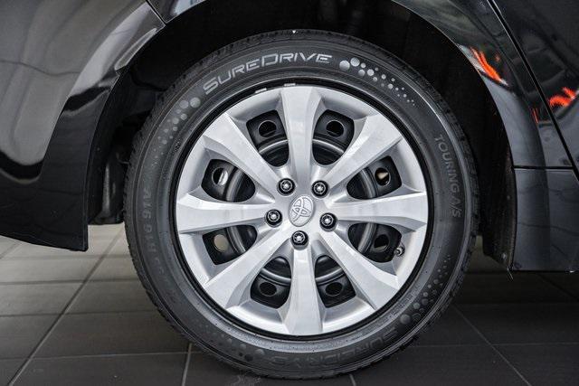 Photo of 2023 Midnight Black Metallic Toyota Corolla