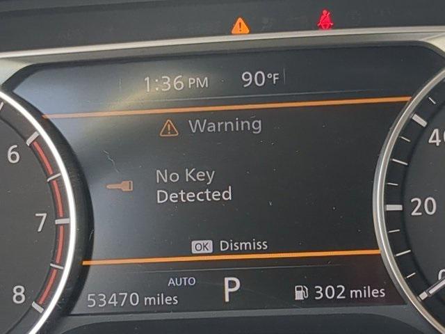 Photo of 2023 Pearl White Tricoat Nissan Rogue
