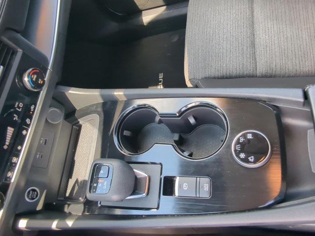 Photo of 2023 Pearl White Tricoat Nissan Rogue