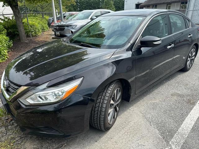 Photo of 2016 Super Black Nissan Altima