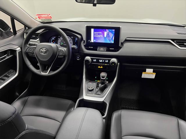 Photo of 2025 Wind Chill Pearl Toyota RAV4 Hybrid