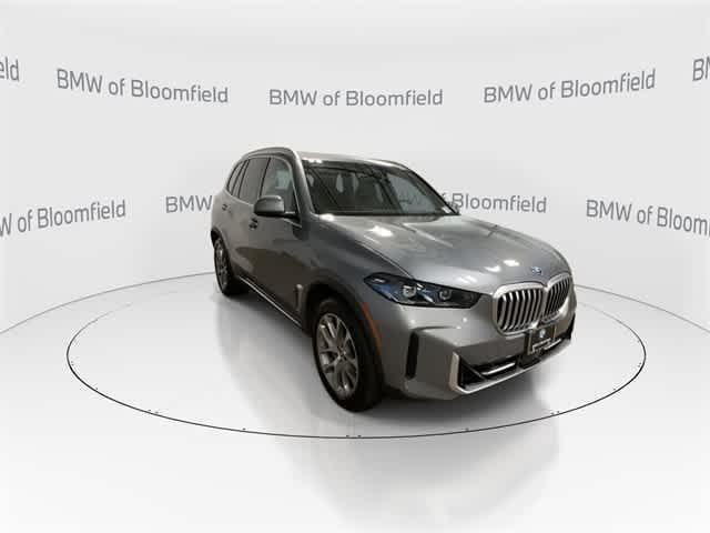 Photo of 2025 Skyscraper Grey Metallic BMW X5 PHEV