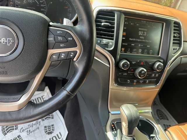 Photo of 2016 White Jeep Grand Cherokee