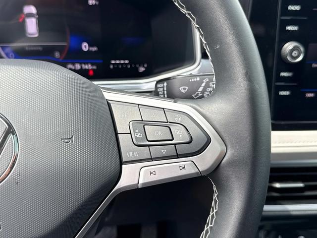 Photo of 2025 Pure White Volkswagen Taos