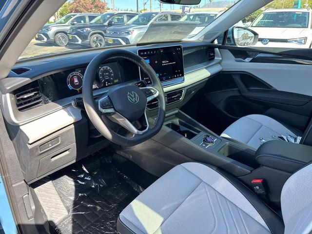 Photo of 2025 Monterey Blue Pearl Volkswagen Tiguan