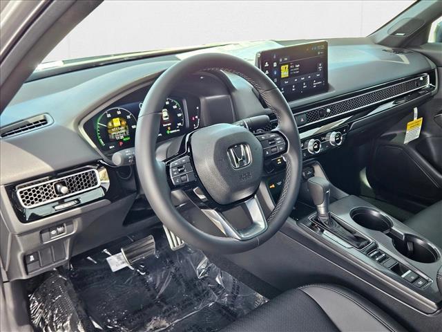 Photo of 2026 Solar Silver Metallic Honda Civic Hybrid