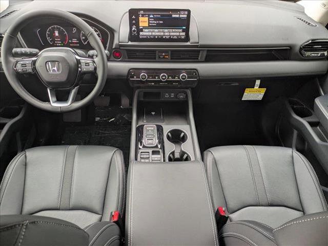 Photo of 2025 Radiant Red Metallic II Honda Pilot