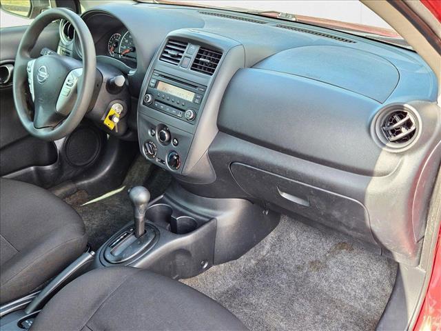 Photo of 2015 Red Brick Nissan Versa